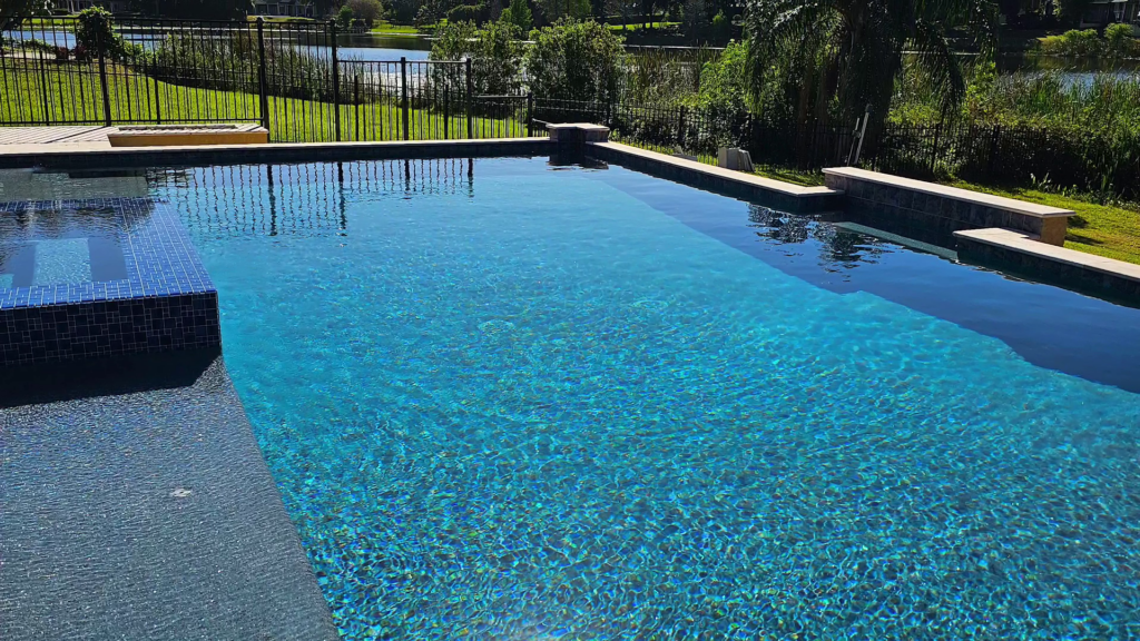 Aquascapes_30s_commercial_pool_image pool lined with mosaic tile