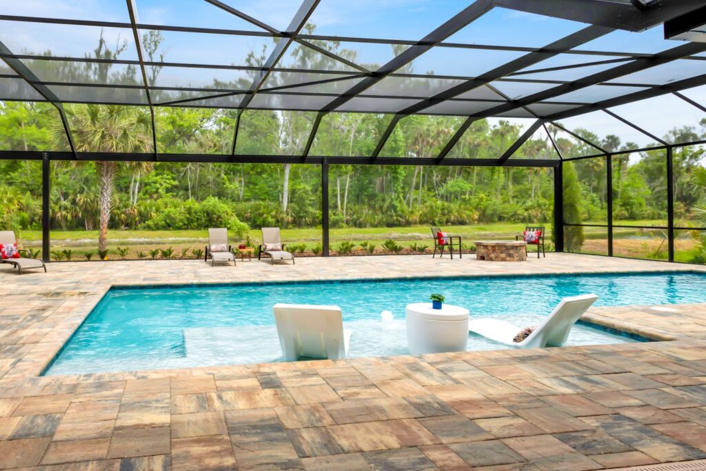 IMG_4865 built in pool with wading deck and screen enclosure